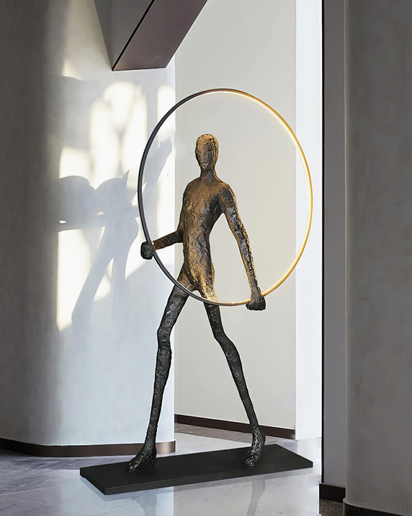 Aeon Sculpture Floor Lamp large format display, geometric frame design with human figure silhouette and LED light
