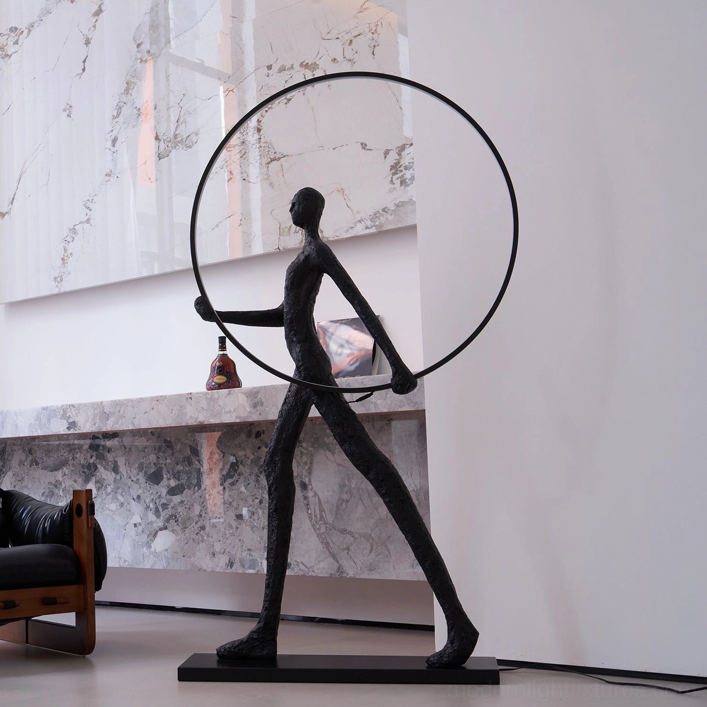 Model A Aeon Sculpture Floor Lamp with remote control dimming feature, geometric human sculpture form detail