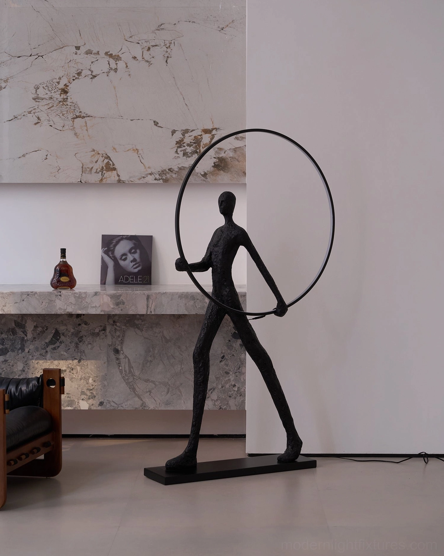 Small size Aeon Sculpture Floor Lamp with geometric frame and integrated LED light, compact sculptural design variation