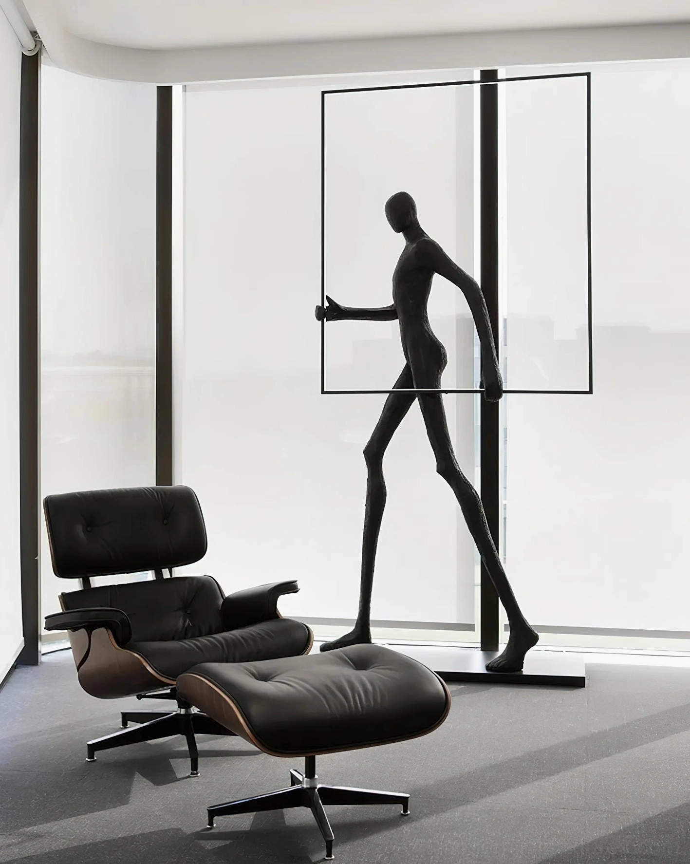 Artistic geometric floor lamp with textured black human sculpture and warm white LED circular light ring