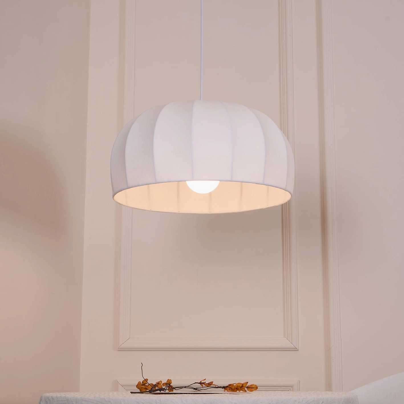 Aeron white pendant light showing 50cm, 60cm, and 68cm diameter size variations for any space