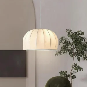 Modern white fabric pendant lamp in contemporary living room interior, soft warm lighting ambiance
