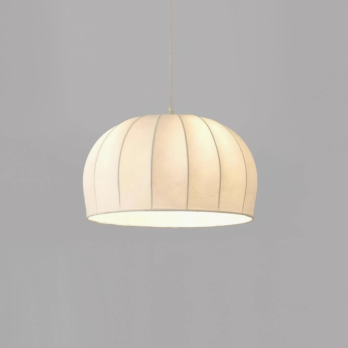 Aeron white ribbed pendant light available in multiple sizes for different interior spaces
