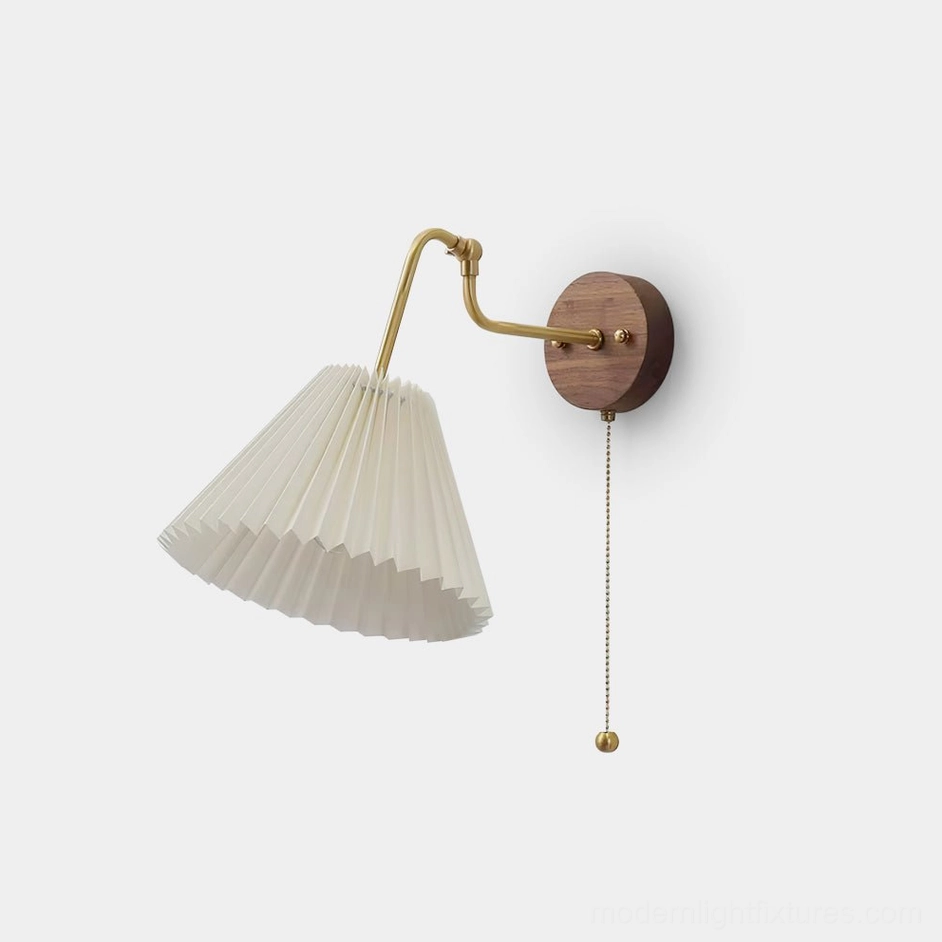 Aine pleated wall lamp wall-mounted detail, walnut wood base, polished brass swing arm, eye-level viewing angle