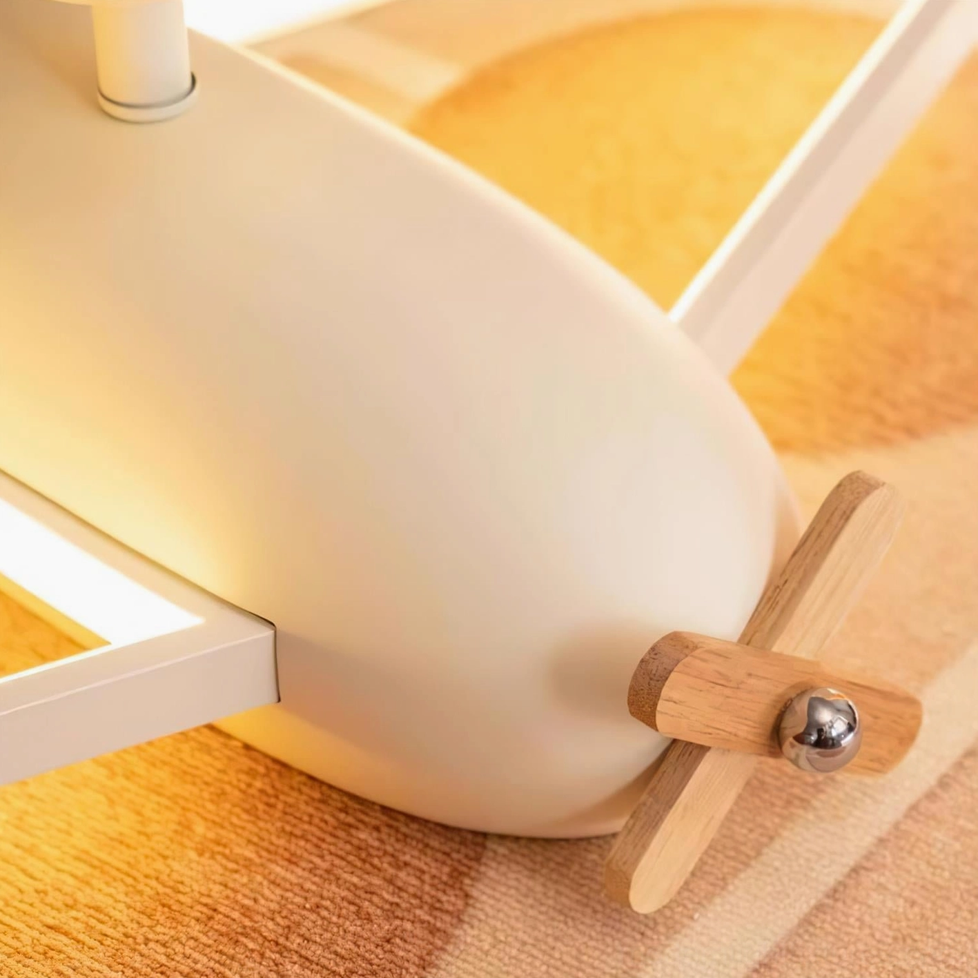 Airplane-themed ceiling light showing damp-rated construction suitable for bathroom installation
