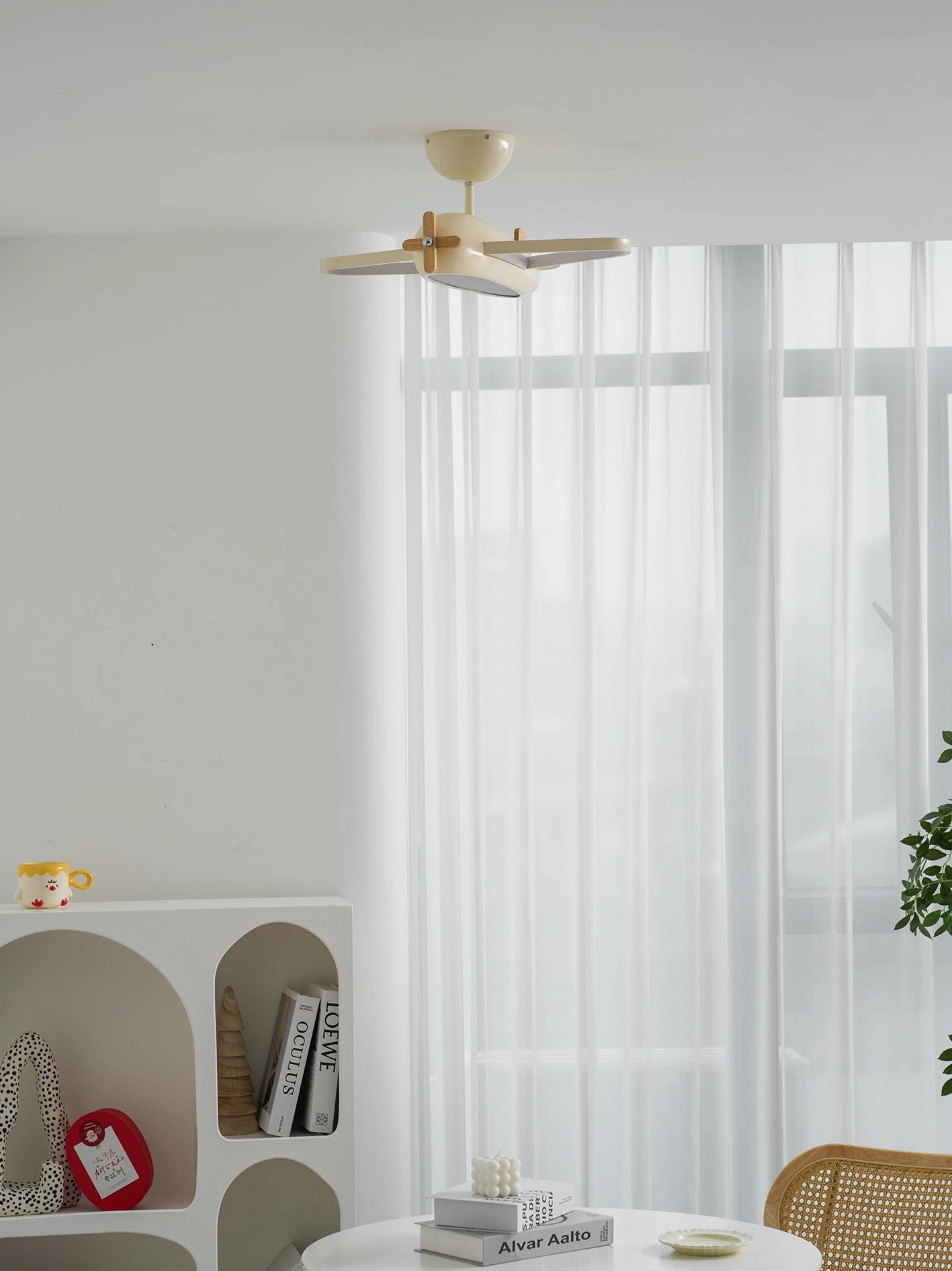 Airplane light fixture front view highlighting sculptural form and three-dimensional design