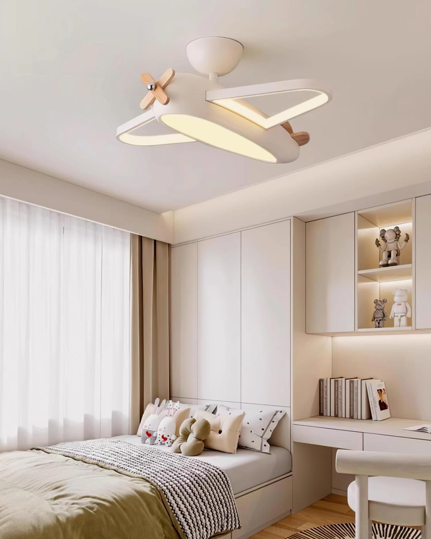Airplane ceiling light installed in kids bedroom, warm LED lighting above bed and study desk