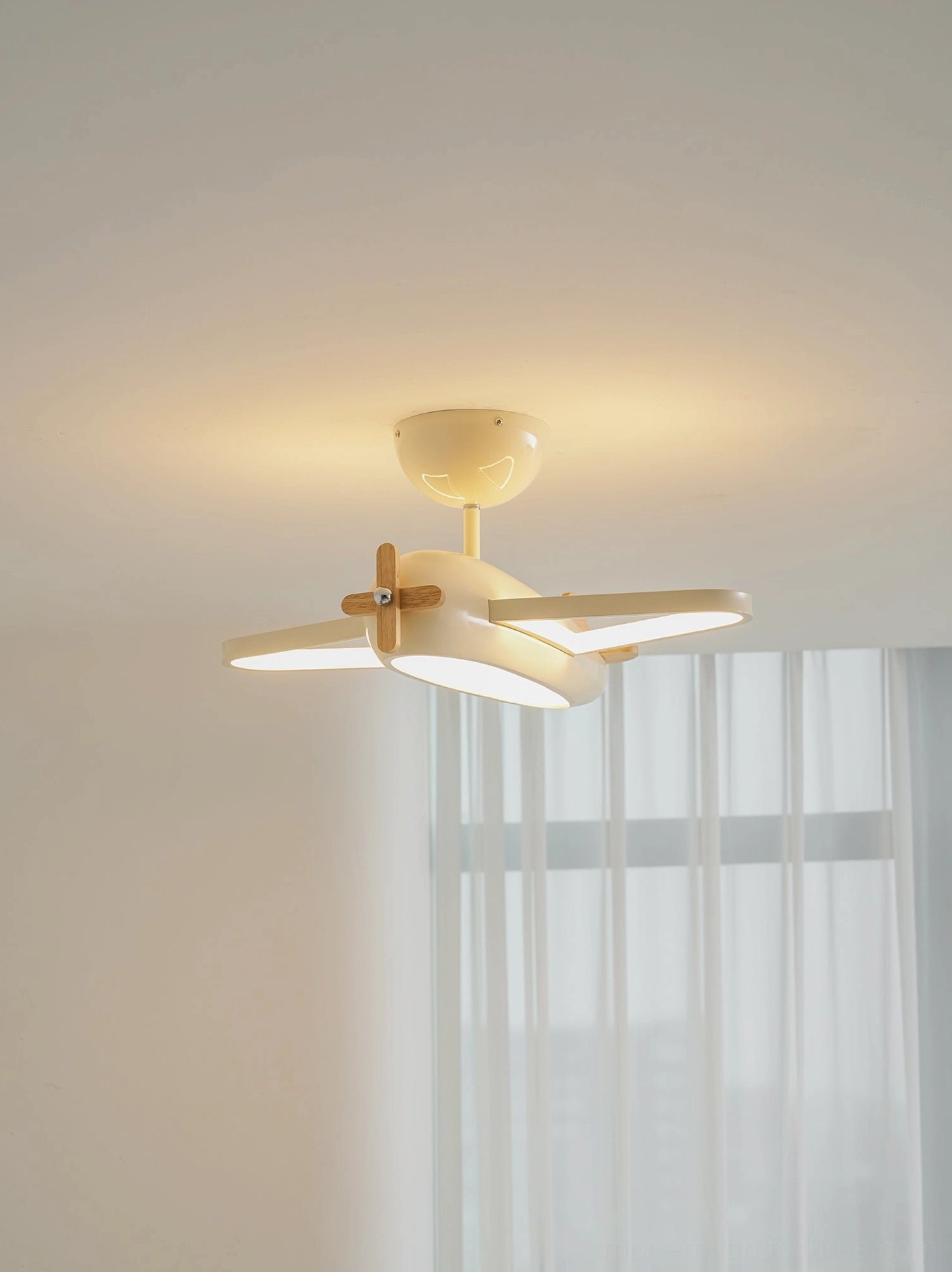 Airplane ceiling lamp underside showing diffuser and light emission characteristics