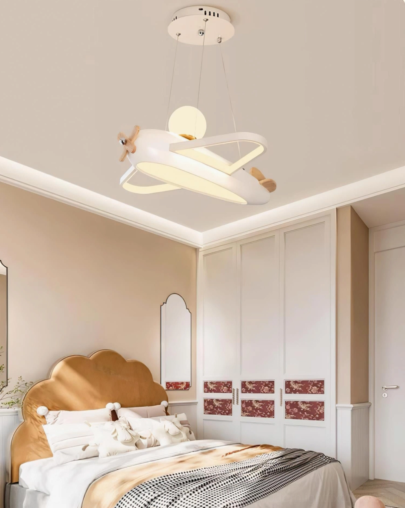 Modern airplane ceiling pendant lamp with acrylic nose cone and metal fuselage in contemporary kids room interior
