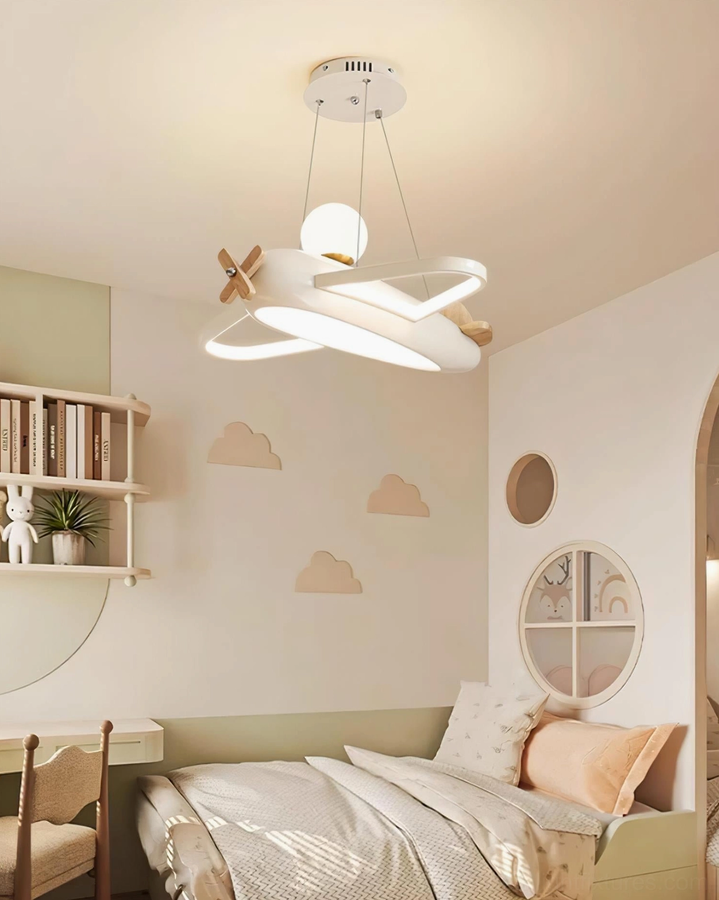 Modern airplane pendant lamp as room focal point creating thematic anchor for aviation inspired kids bedroom design