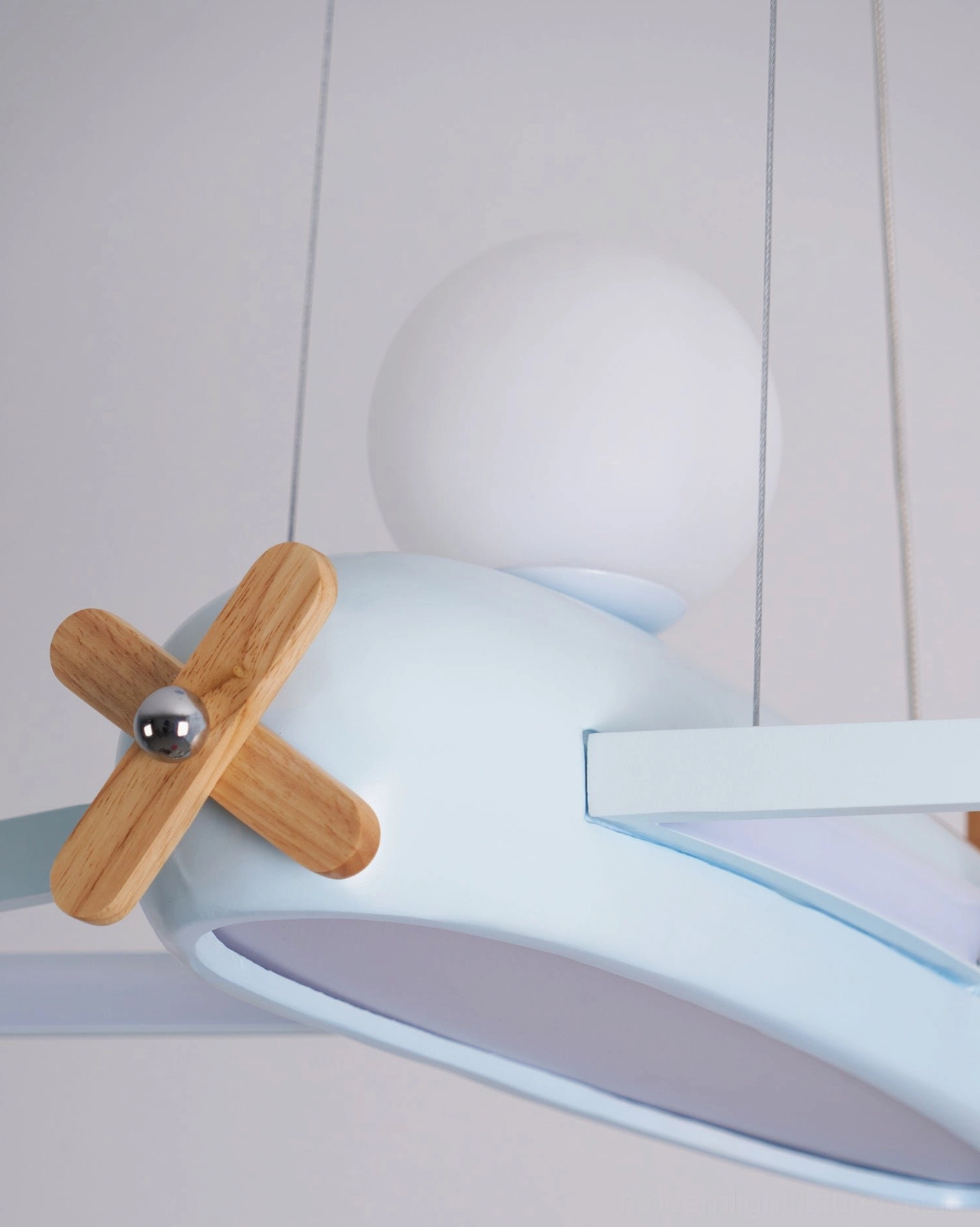 Airplane pendant lamp showing competitive modern design quality against traditional generic ceiling light fixtures