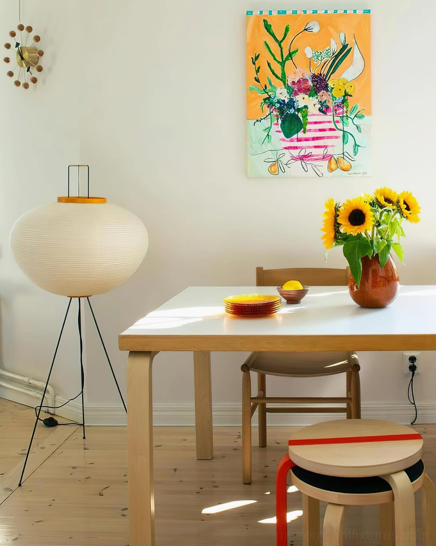Akari 10A floor lamp in home office space providing soft task and ambient illumination solution