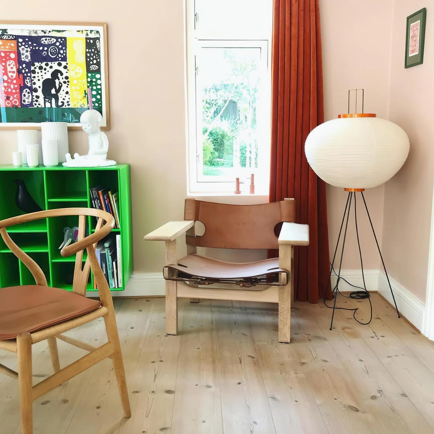 Akari 10A floor lamp paired with mid-century modern furniture and decor elements