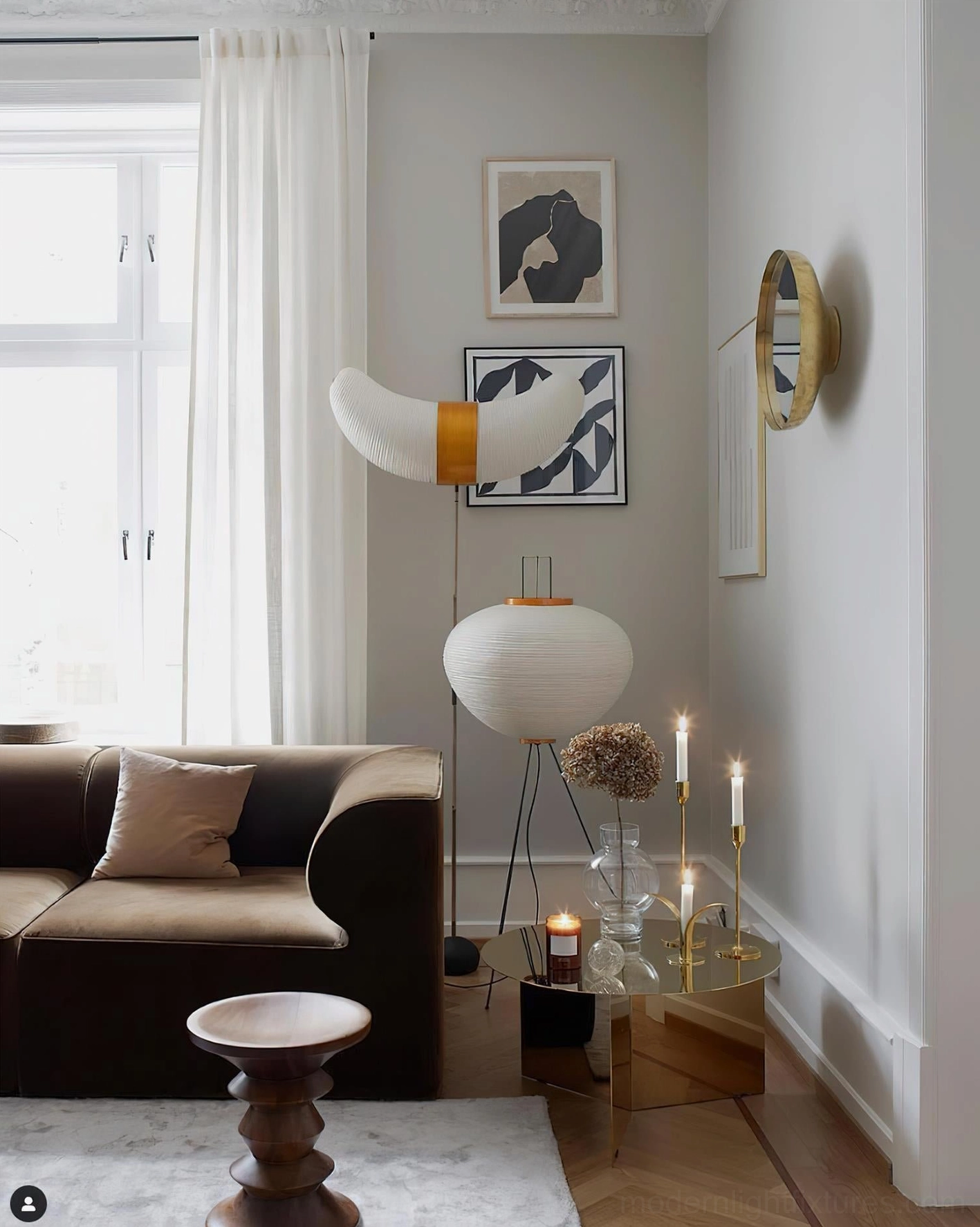 Akari 10A floor lamp unlit showing pure white shade material and sculptural form against dark background