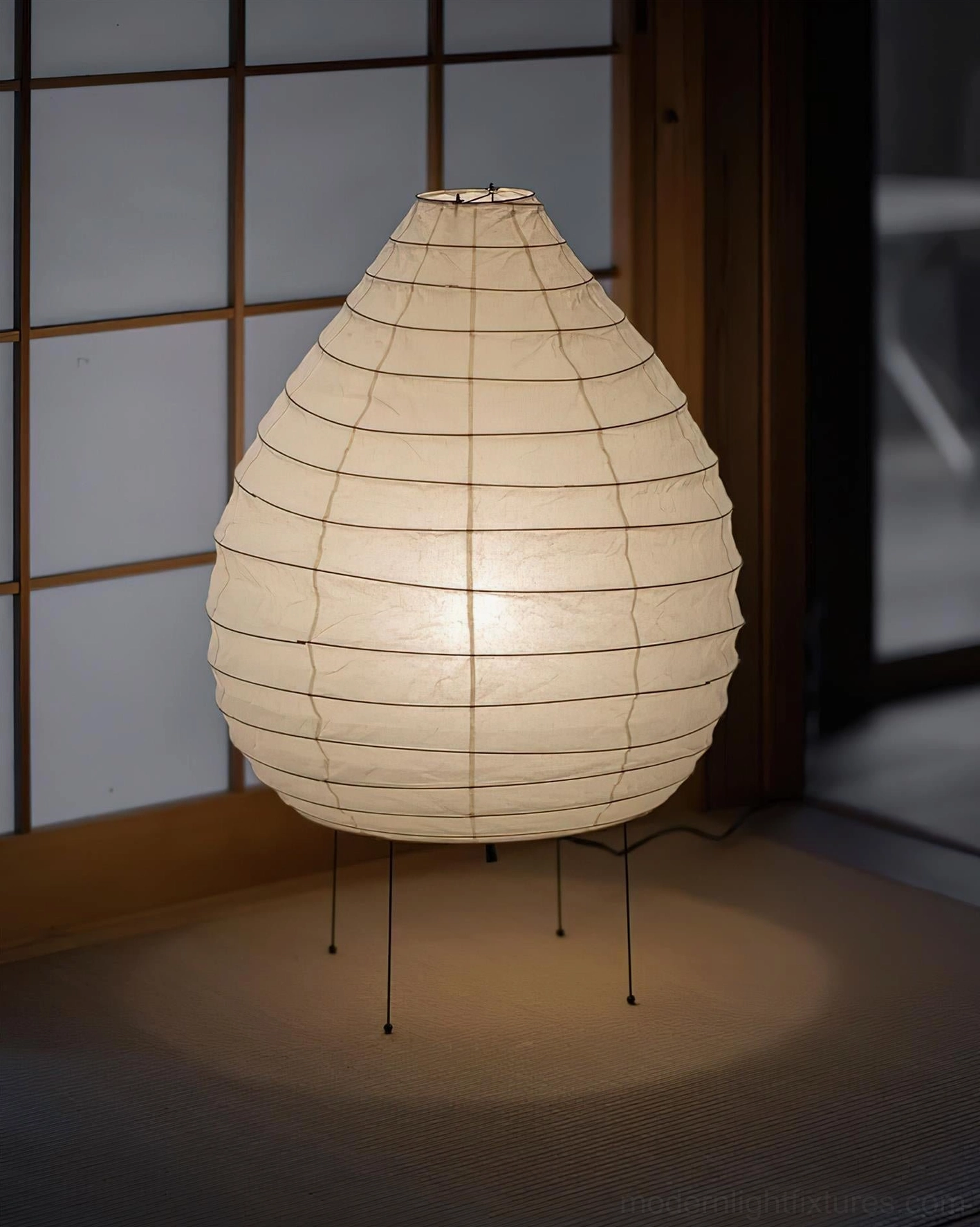 Akari 23N teardrop floor lamp mid-century modern interior with natural wood furniture