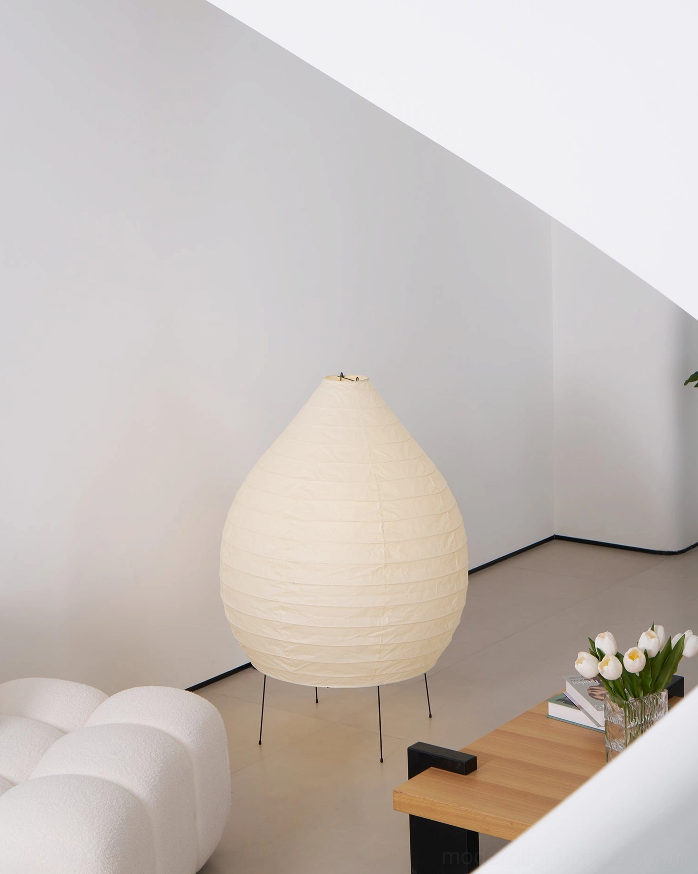 Akari 23N teardrop floor lamp close-up of ribbed washi paper diffuser and light emission