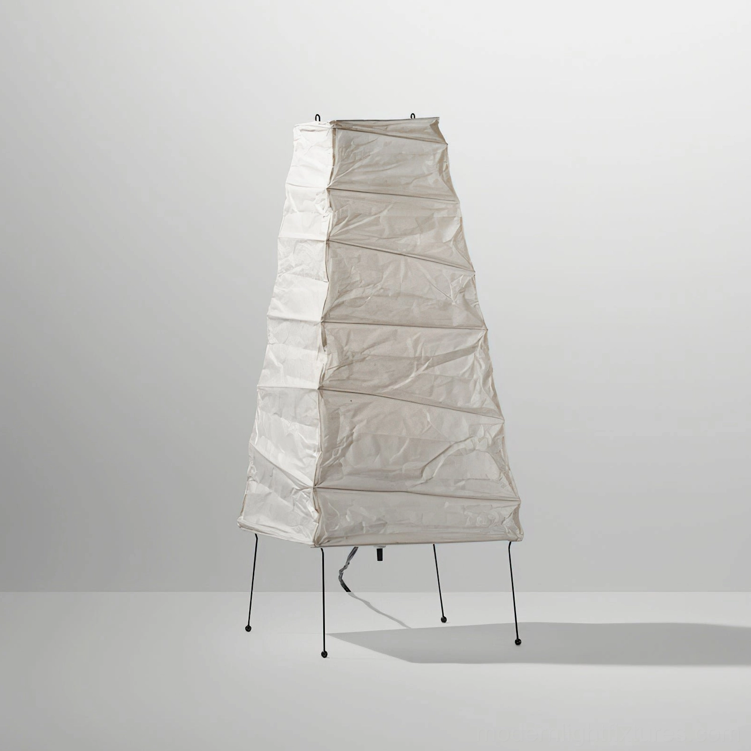 Akari 4N table lamp rear three-quarter view showing power cord and metal frame