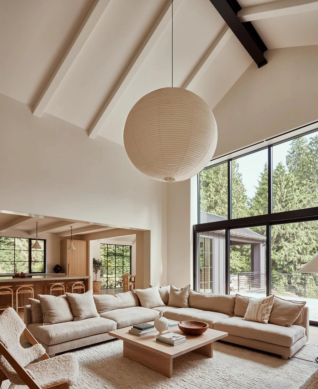 Multiple Akari A pendant lamps creating layered lighting in open-plan space