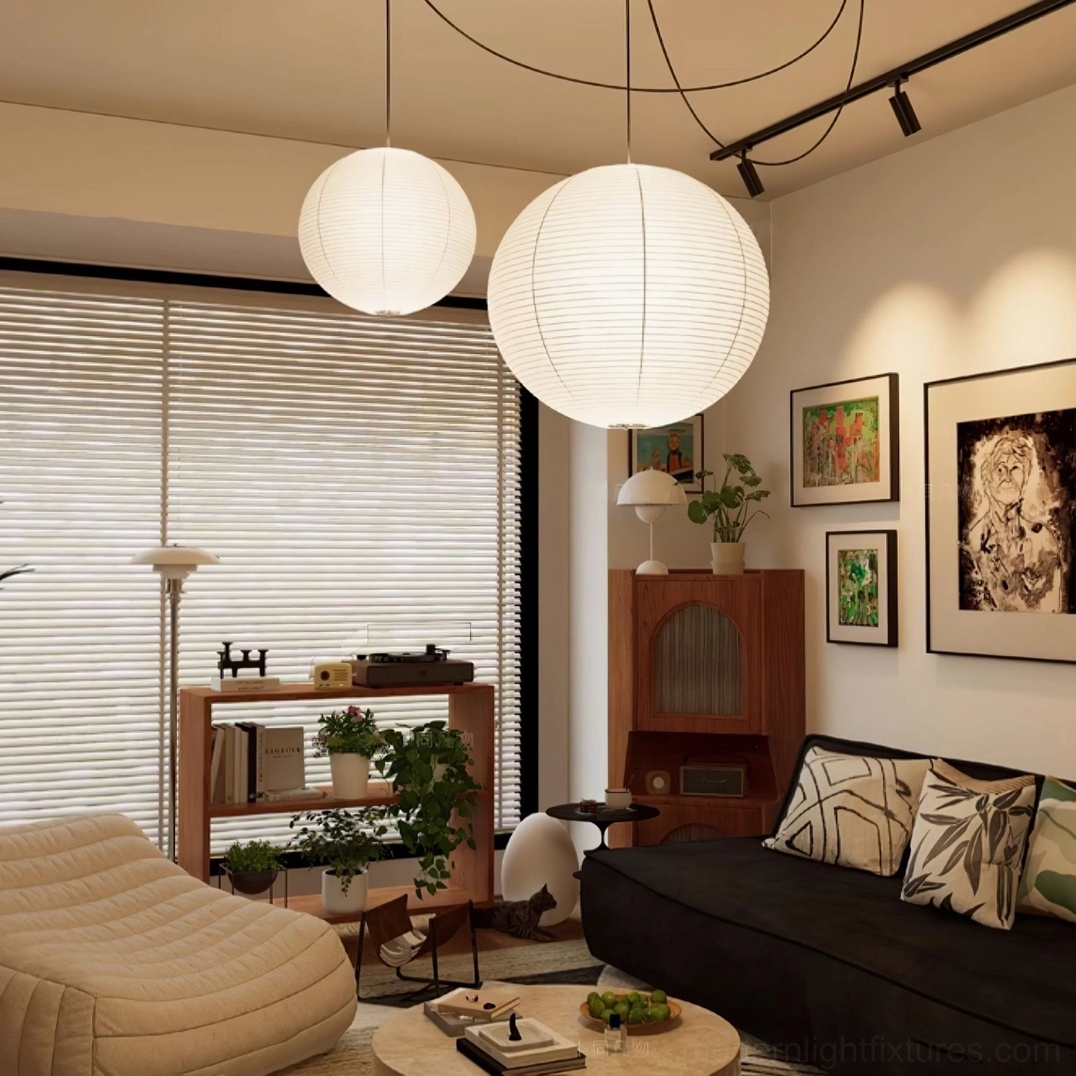 Multiple Akari paper pendant lights with black cords in contemporary living room ceiling installation