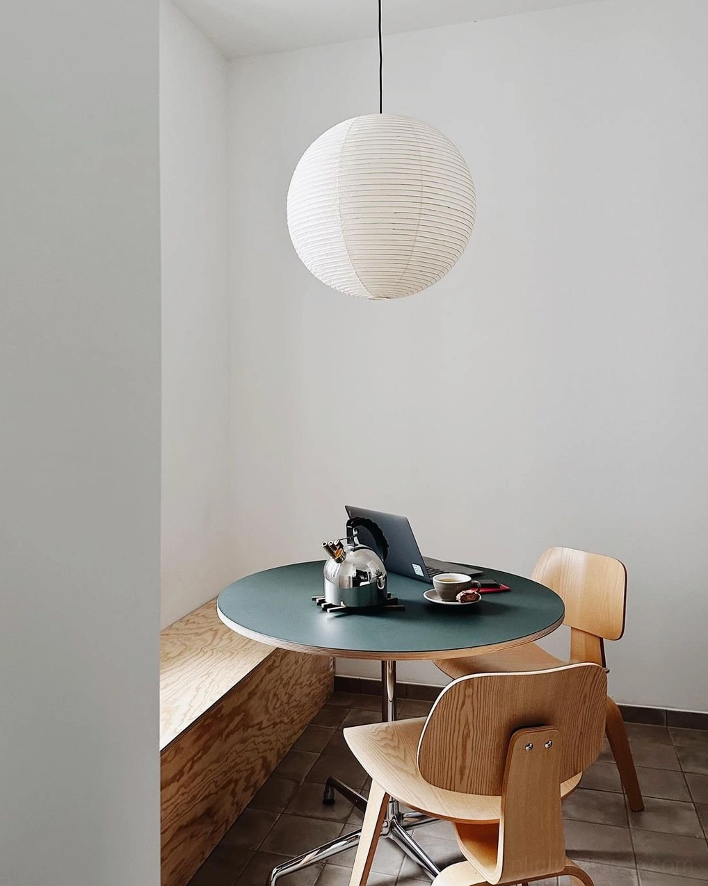 Small white Akari A pendant lamp in compact modern dining nook