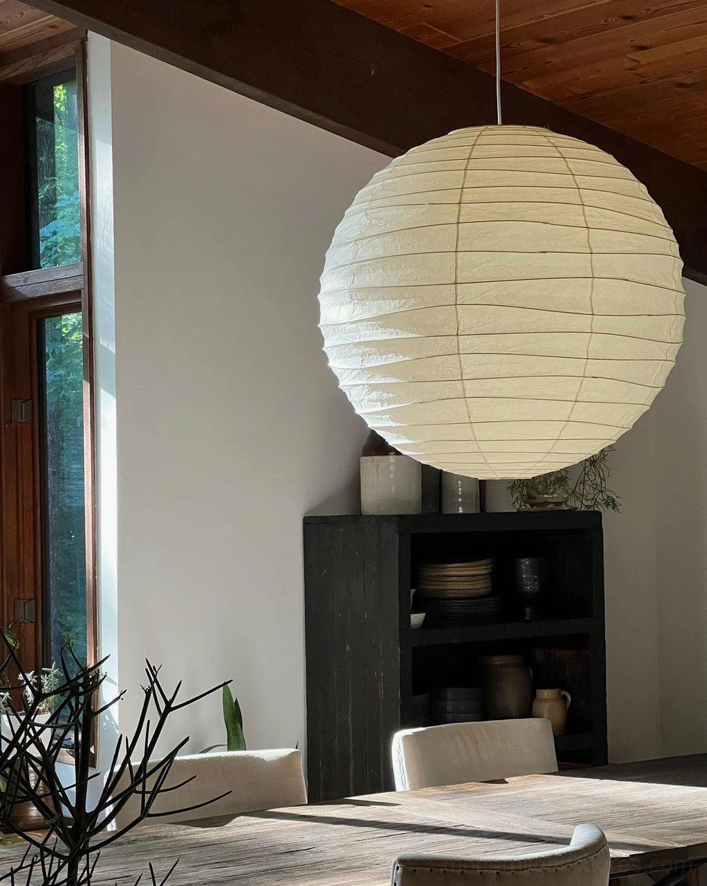 Akari D Series pendant lamp - warm ambient glow in residential mid-century modern setting