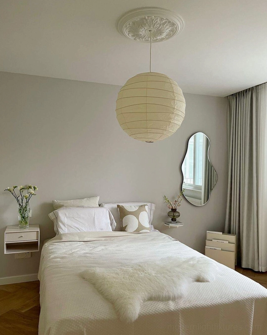 Akari D pendant lamp with dimmable feature - showing light intensity adjustment range