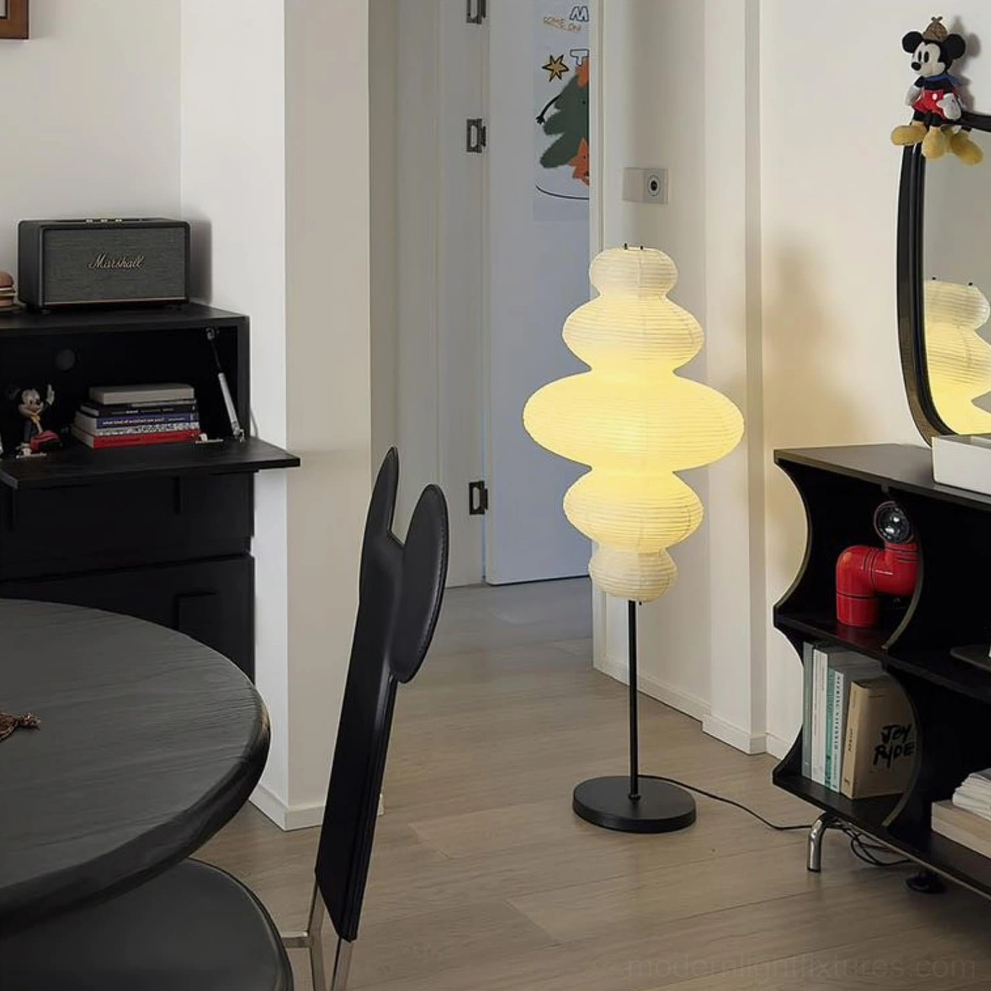 Full view of Akari Juni sculptural floor lamp showing organic gourd-shaped design and proportions