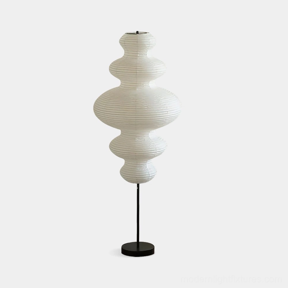 Akari Juni handcrafted paper floor lamp with multi-layered white shade and black metal stand, studio view