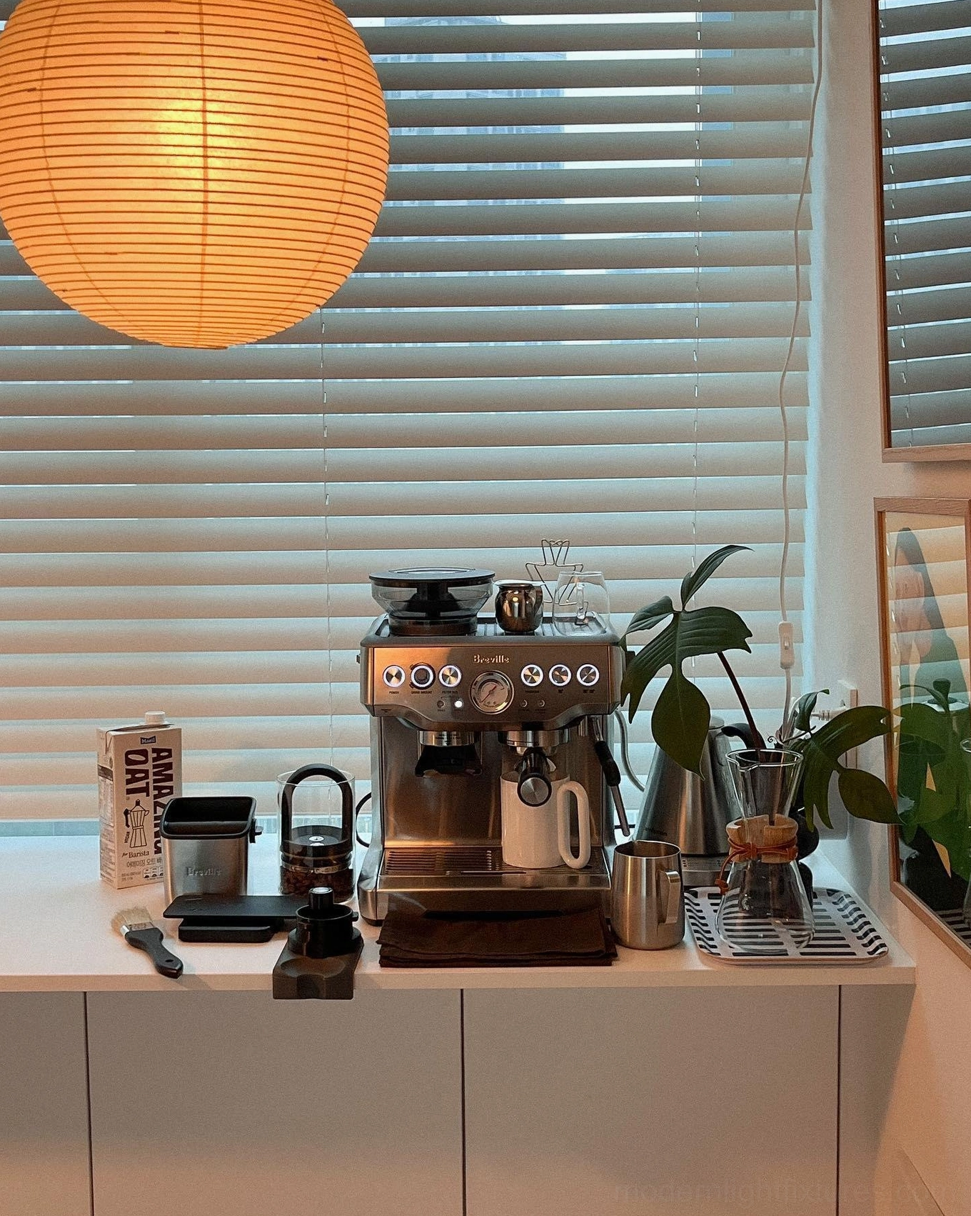 Modern Akari white paper pendant light with black cord and E26 E27 socket specifications