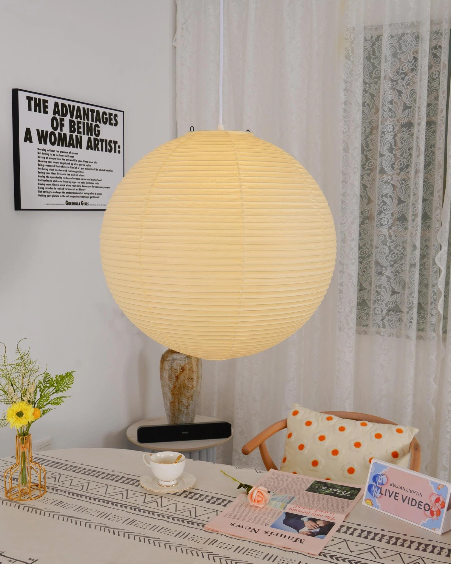 Akari cotton paper pendant lamp over dining table minimalist arrangement