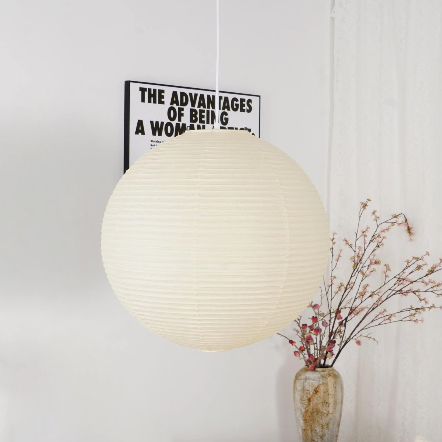Akari pendant lamp side profile showing spherical form and proportions