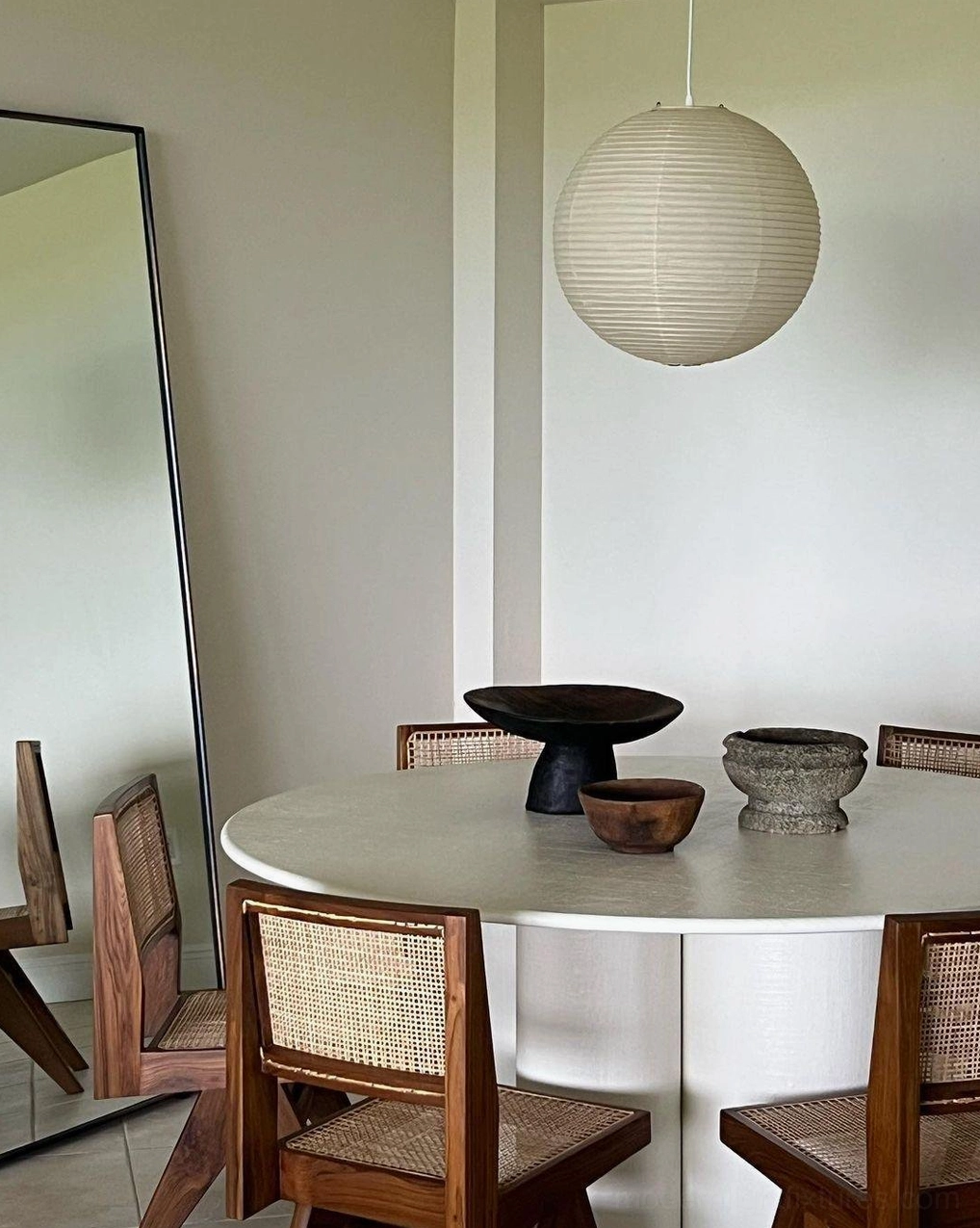 Akari pendant lamp hanging installation with suspension cable visible