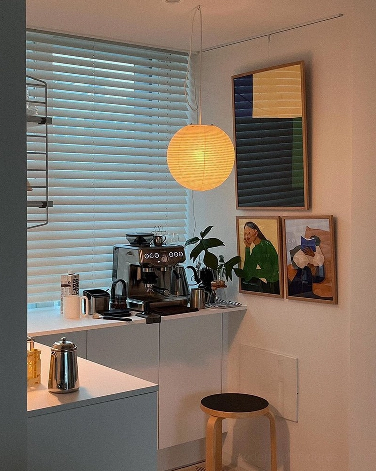 Akari A Series pendant lamp white paper shade with black cord for modern interiors