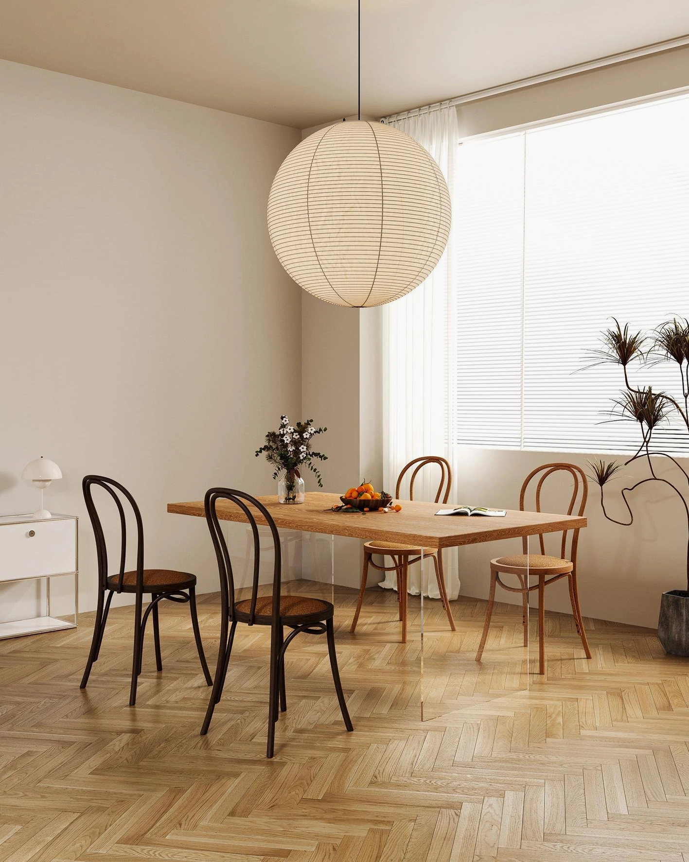 Akari Round 100cm statement pendant lamp anchoring open-plan dining space