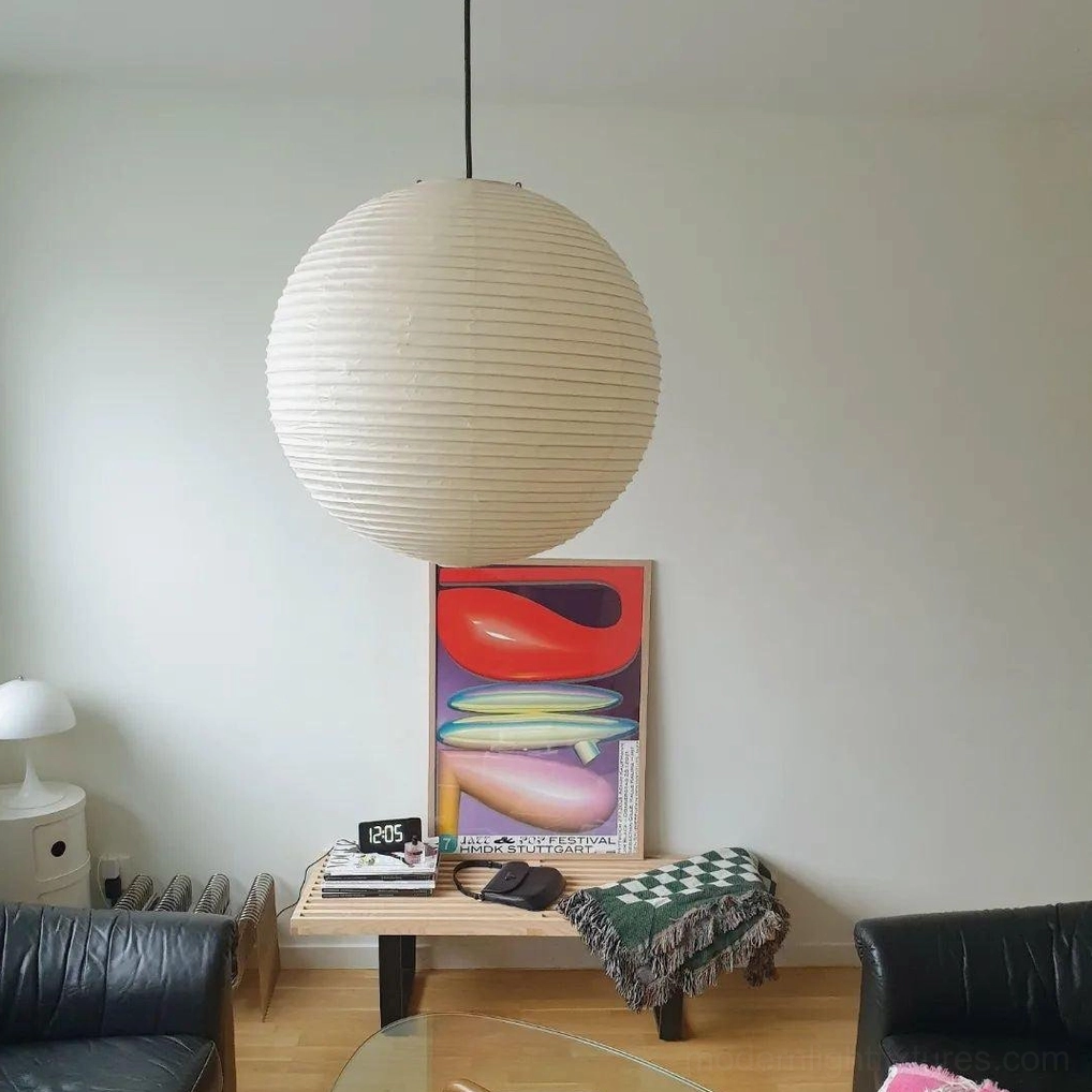 Akari Round pendant lamp installed with adjustable 150cm cord in high ceiling space