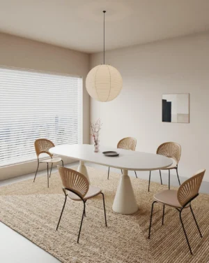 Akari Round 60cm pendant lamp hanging above dining table in Nordic style dining room with woven rug
