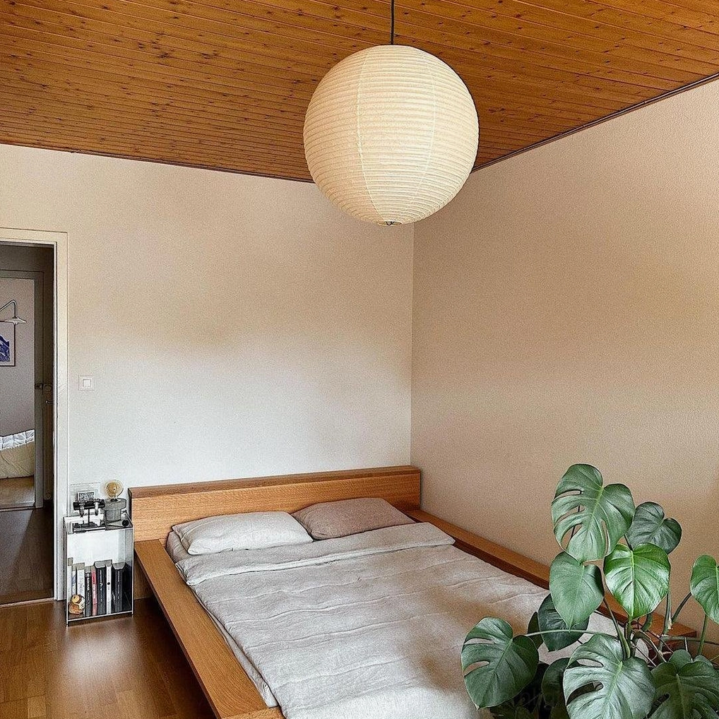Akari Round pendant lamp showing mulberry paper translucence with interior illumination