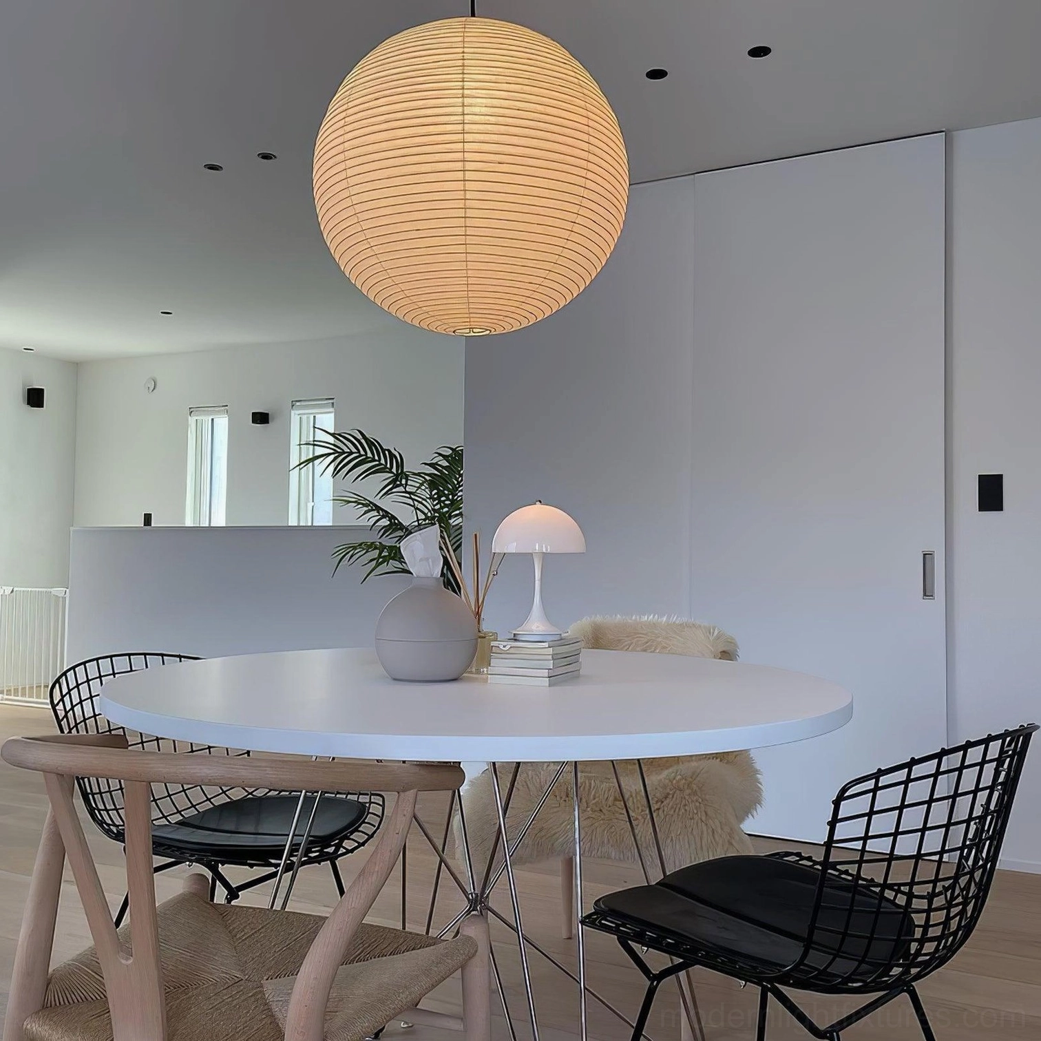 Akari Round pendant lamp in minimalist Scandinavian interior with neutral palette