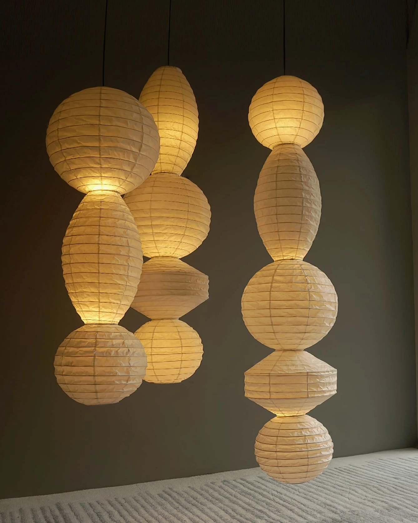 Akari Tayo dual stacked paper pendant lights with warm illumination, asymmetrical wabi-sabi design