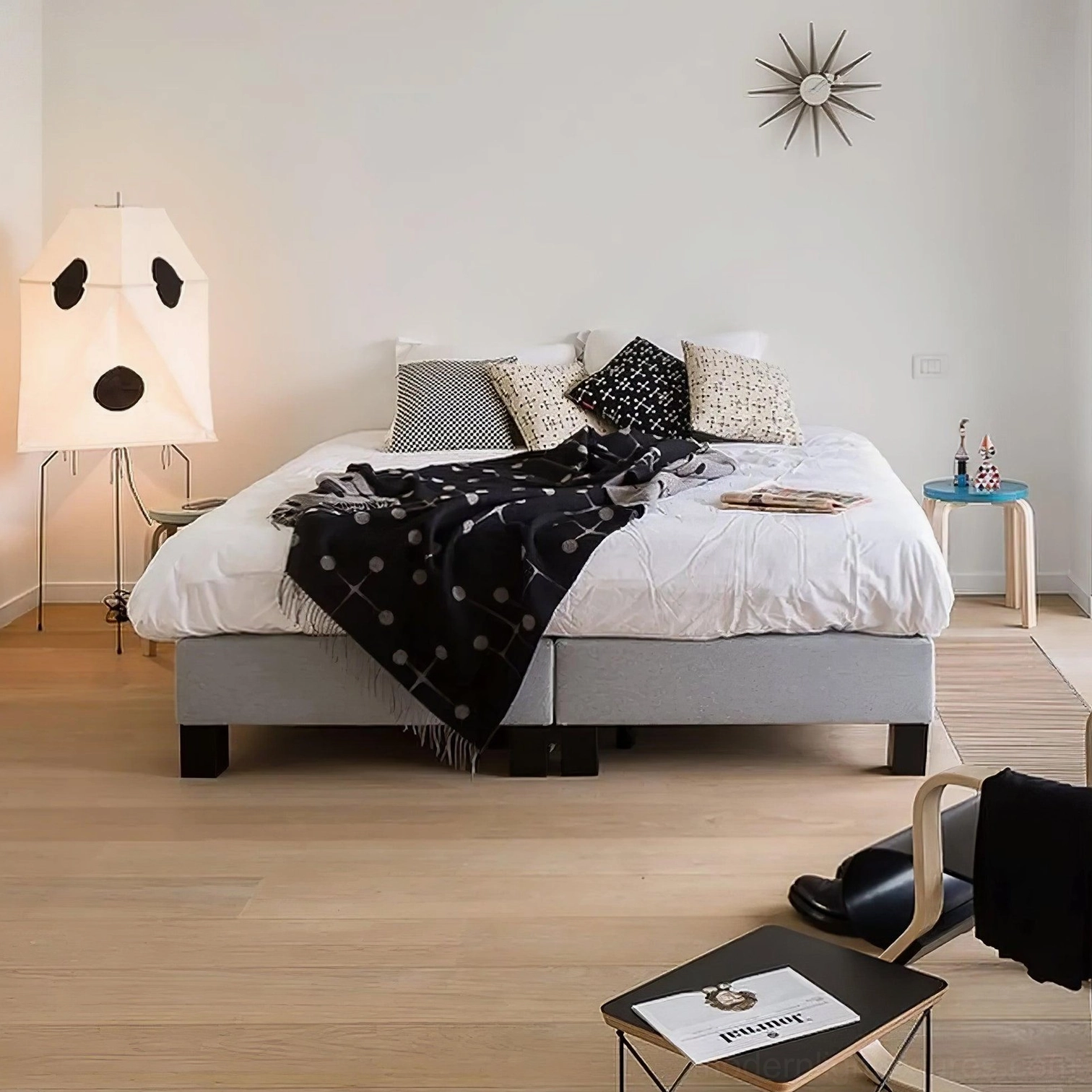 Akari UF3-Q polka dot paper floor lamp in modern Scandinavian bedroom side view