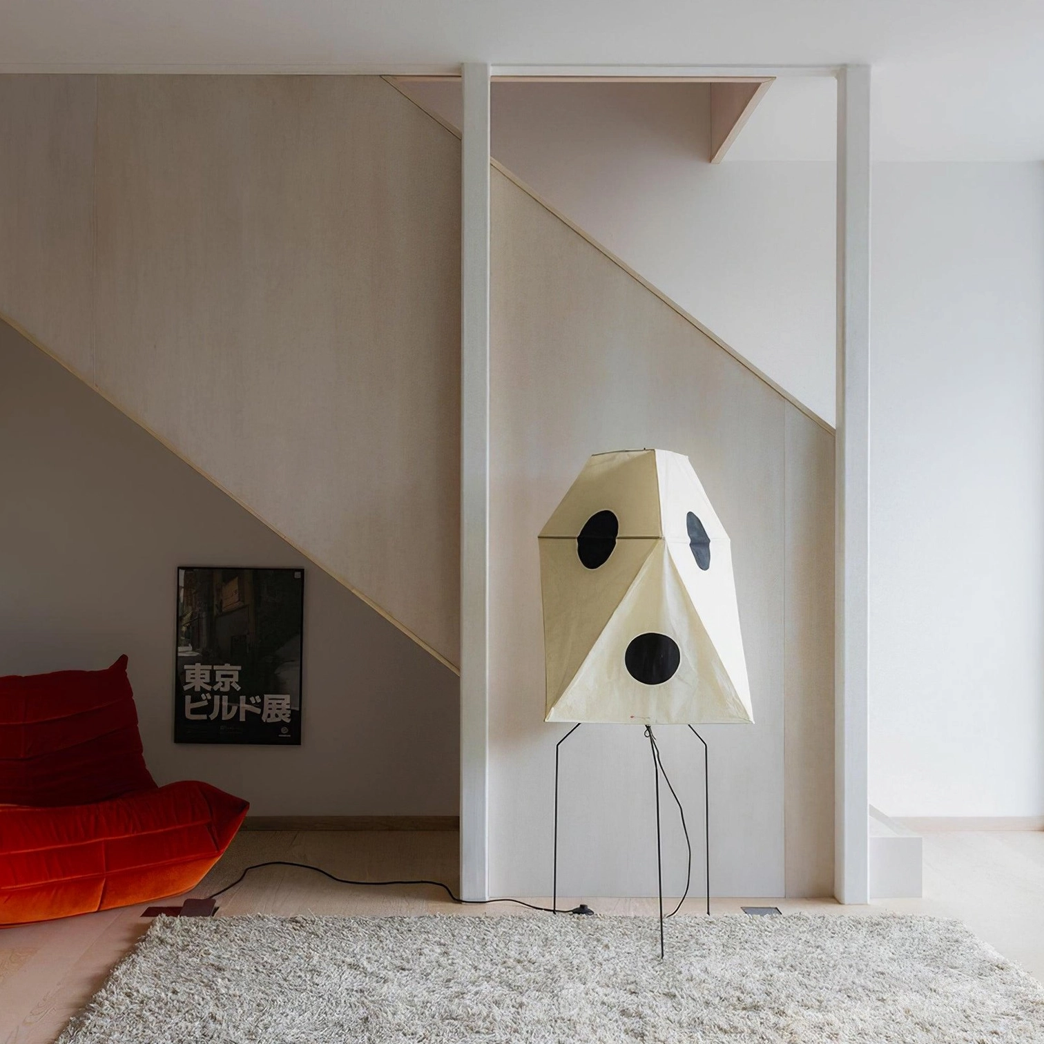 Akari UF3-Q washi paper floor lamp with polka dot pattern in neutral living space