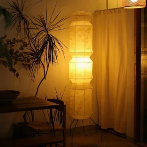 Akari UF4-L6 floor lamp illuminated in warm bohemian dining space, creating cozy ambient light