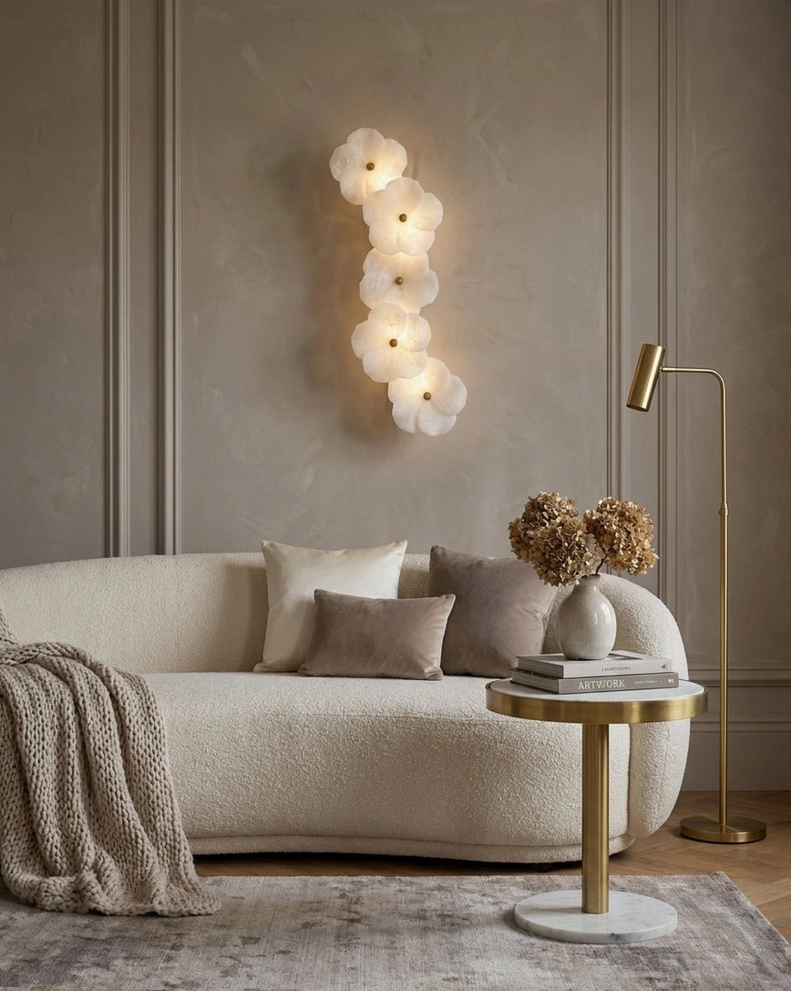 Alabaster Bloom Wall Sconce in formal living room, neoclassical sculptural design with brass