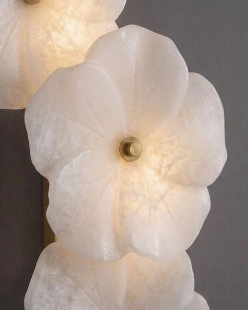 Alabaster Bloom Wall Sconce lit detail view, translucent alabaster glow with warm 2700K LED