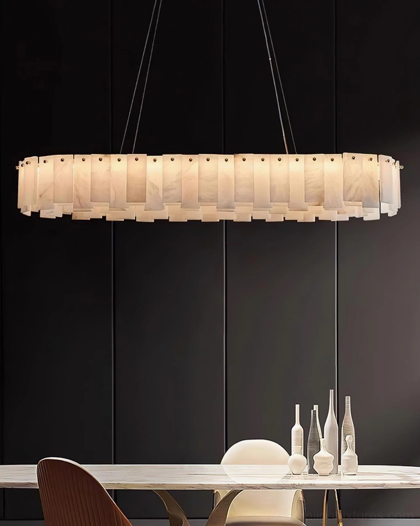 Alabaster chandelier with dual configuration showing staggered tiers, geometric floating ring design in natural translucent stone with warm brass suspension hardware