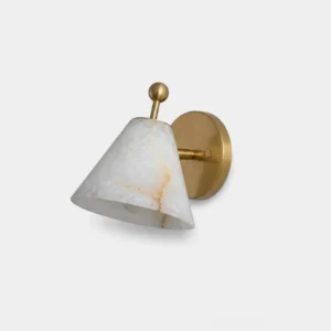 Hand-carved natural alabaster cone wall sconce with polished brass arm and ball detail on round backplate, studio frontal view