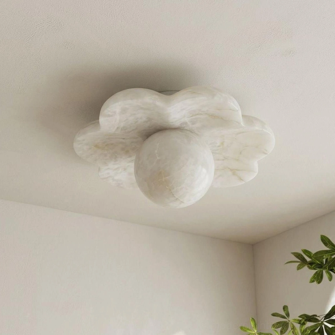Natural alabaster carved flower ceiling light installed, close-up detail showing translucent veining and stone texture in minimalist interior