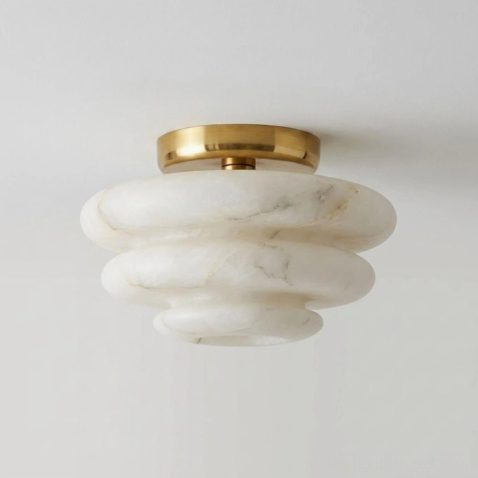 Alabaster ceiling light fixture product shot showing brass canopy and tiered natural stone shade construction