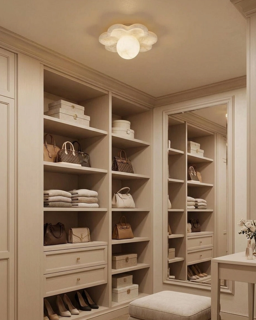 Hand-carved natural alabaster flower ceiling light in walk-in closet with built-in wooden wardrobe and soft overhead illumination