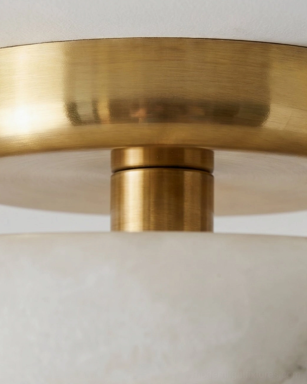 Alabaster flush mount ceiling fixture showing complete tiered disc structure and warm brass canopy assembly